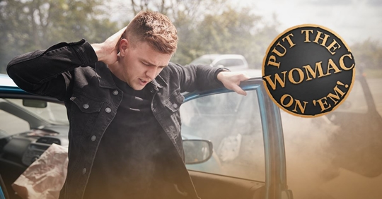 man holding his neck after accident