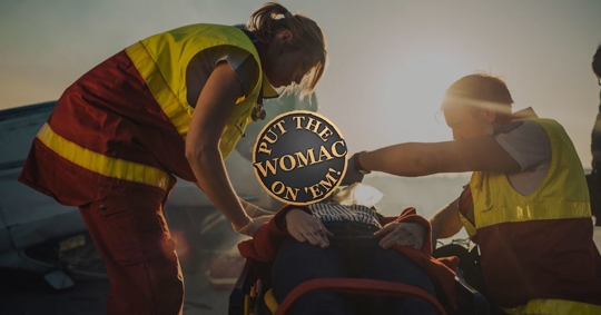 person getting put on stretcher after car accident