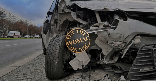 car crashed on side of road